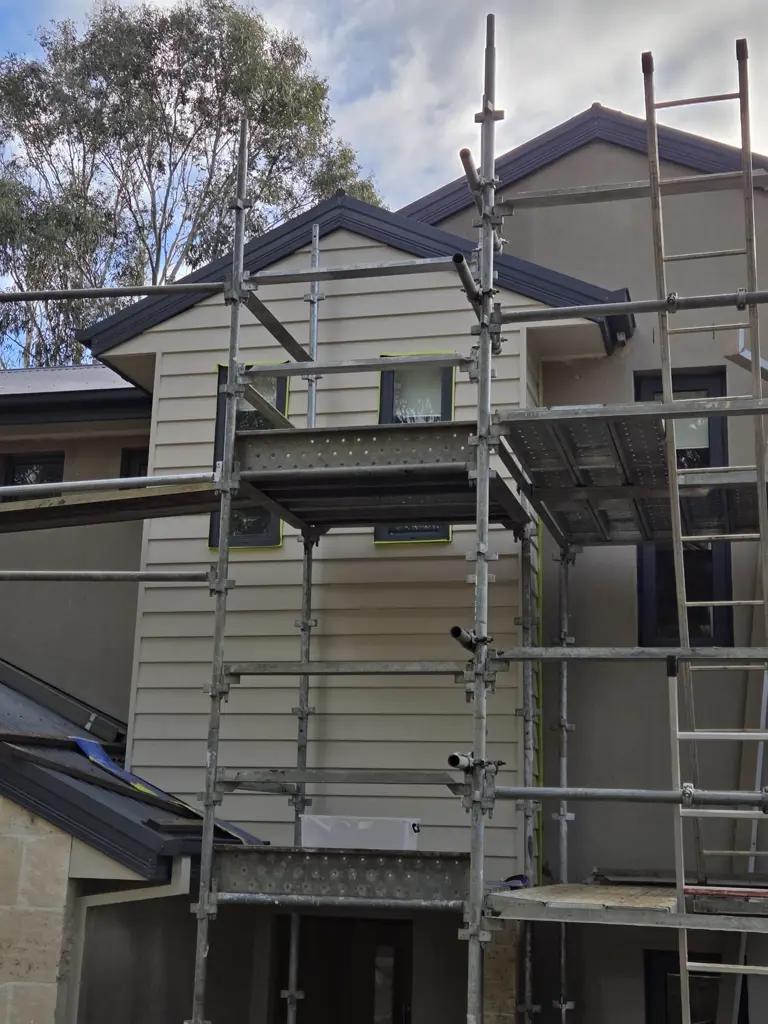 Weatherboard exterior repaint with scaffolding in place